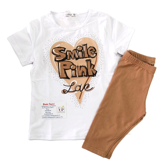 Completo da bambina composto da t-shirt bianca con scritta beige Smile Pink love su cuore e ciclista beige.